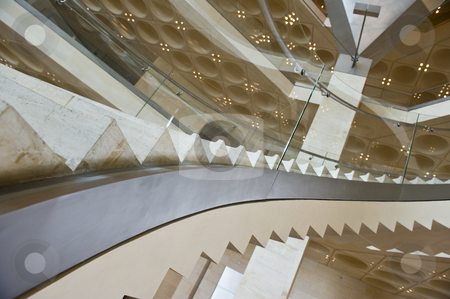 To use this stock image in your creative project, please select the size you need over to the right and click the "Add to Cart" button.
Your downloaded image will come with the Cutcaster watermark removed so don’t worry about the watermark you see on this page. Modern stairs stock photo, A modern curved staircase in a luxurious building. by Nicolaas Traut