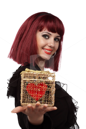 To use this stock image in your creative project, please select the size you need over to the right and click the "Add to Cart" button.
Your downloaded image will come with the Cutcaster watermark removed so don’t worry about the watermark you see on this page. Beautiful woman with heart packed in a golden gift box stock photo, Beautiful woman smiling with heart packed in a golden gift box in her hand.Shallow DOF,focus on the face. by Ivelin Radkov