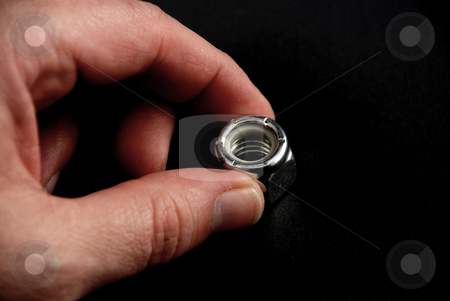 To use this stock image in your creative project, please select the size you need over to the right and click the "Add to Cart" button.
Your downloaded image will come with the Cutcaster watermark removed so don’t worry about the watermark you see on this page. Nuts and bolts stock photo, Stock pictures of washers used for industrial purposes by Albert Lozano
