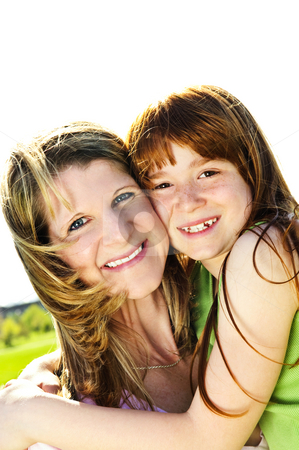To use this stock image in your creative project, please select the size you need over to the right and click the "Add to Cart" button.
Your downloaded image will come with the Cutcaster watermark removed so don’t worry about the watermark you see on this page. Mother and daughter hugging stock photo, Portrait of happy child hugging her mother by Elena Elisseeva