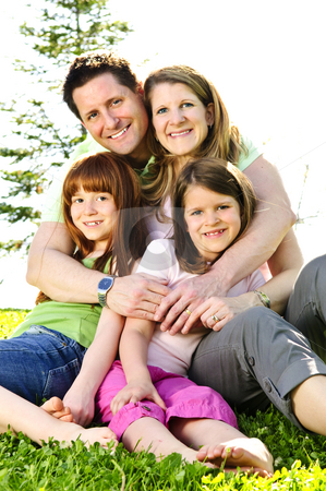 To use this stock image in your creative project, please select the size you need over to the right and click the "Add to Cart" button.
Your downloaded image will come with the Cutcaster watermark removed so don’t worry about the watermark you see on this page. Happy family stock photo, Portrait of happy family of four sitting on grass at the park hugging by Elena Elisseeva