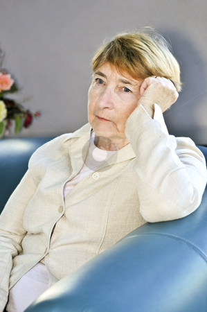 To use this stock image in your creative project, please select the size you need over to the right and click the "Add to Cart" button.
Your downloaded image will come with the Cutcaster watermark removed so don’t worry about the watermark you see on this page. Sad elderly woman stock photo, Sad elderly woman sitting on a couch indoors by Elena Elisseeva