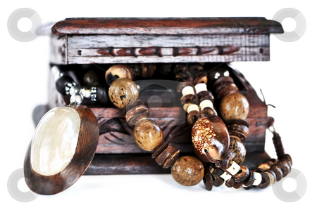 To use this stock image in your creative project, please select the size you need over to the right and click the "Add to Cart" button.
Your downloaded image will come with the Cutcaster watermark removed so don’t worry about the watermark you see on this page. Wooden jewelry box stock photo, Beautiful handcrafted wooden box with aboriginal jewelry by Elena Elisseeva
