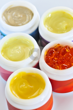 To use this stock image in your creative project, please select the size you need over to the right and click the "Add to Cart" button.
Your downloaded image will come with the Cutcaster watermark removed so don’t worry about the watermark you see on this page. Skin care creams stock photo, Colorful jars of skin care creams and lotions by Elena Elisseeva