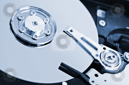 To use this stock image in your creative project, please select the size you need over to the right and click the "Add to Cart" button.
Your downloaded image will come with the Cutcaster watermark removed so don’t worry about the watermark you see on this page. Hard drive detail stock photo, Closeup of hard disk drive internal components by Elena Elisseeva