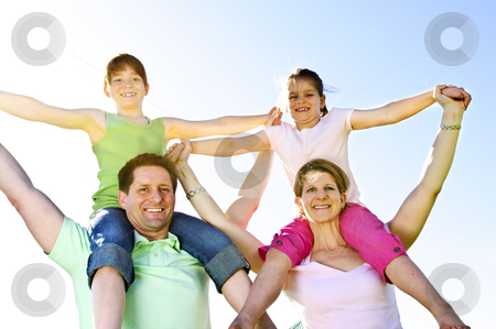 To use this stock image in your creative project, please select the size you need over to the right and click the "Add to Cart" button.
Your downloaded image will come with the Cutcaster watermark removed so don’t worry about the watermark you see on this page. Happy family stock photo, Portrait of happy parents giving children shoulder rides by Elena Elisseeva