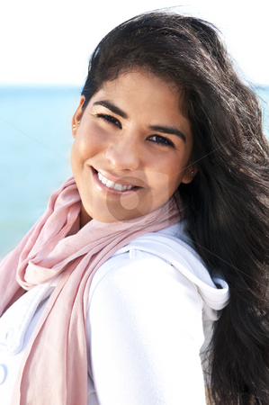 To use this stock image in your creative project, please select the size you need over to the right and click the "Add to Cart" button.
Your downloaded image will come with the Cutcaster watermark removed so don’t worry about the watermark you see on this page. Young native american woman stock photo, Portrait of beautiful smiling native american girl by Elena Elisseeva