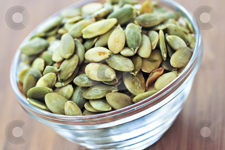 To use this stock image in your creative project, please select the size you need over to the right and click the "Add to Cart" button.
Your downloaded image will come with the Cutcaster watermark removed so don’t worry about the watermark you see on this page. Pumpkin seeds stock photo, Pumpkin seeds close up in glass bowl by Elena Elisseeva