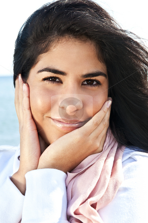 To use this stock image in your creative project, please select the size you need over to the right and click the "Add to Cart" button.
Your downloaded image will come with the Cutcaster watermark removed so don’t worry about the watermark you see on this page. Young native american woman stock photo, Portrait of beautiful smiling native american girl with hands at her face by Elena Elisseeva