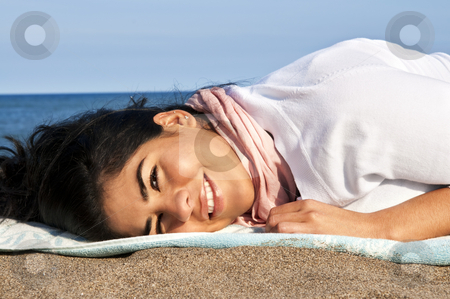 To use this stock image in your creative project, please select the size you need over to the right and click the "Add to Cart" button.
Your downloaded image will come with the Cutcaster watermark removed so don’t worry about the watermark you see on this page. Young native american woman at beach stock photo, Portrait of beautiful smiling native american girl laying at beach by Elena Elisseeva