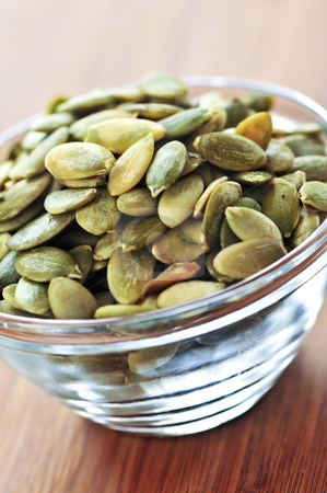 To use this stock image in your creative project, please select the size you need over to the right and click the "Add to Cart" button.
Your downloaded image will come with the Cutcaster watermark removed so don’t worry about the watermark you see on this page. Pumpkin seeds stock photo, Pumpkin seeds close up in glass bowl by Elena Elisseeva