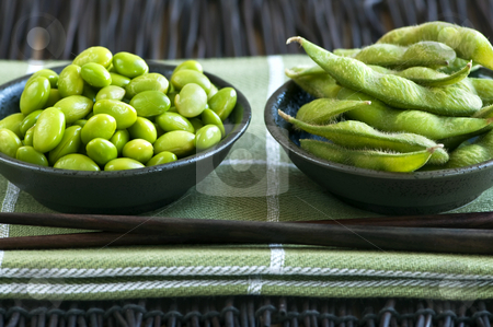 To use this stock image in your creative project, please select the size you need over to the right and click the "Add to Cart" button.
Your downloaded image will come with the Cutcaster watermark removed so don’t worry about the watermark you see on this page. Soy beans in bowls stock photo, Edamame soy beans shelled and with pods in bowls by Elena Elisseeva