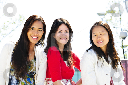 To use this stock image in your creative project, please select the size you need over to the right and click the "Add to Cart" button.
Your downloaded image will come with the Cutcaster watermark removed so don’t worry about the watermark you see on this page. Group of young girl friends stock photo, Group of three diverse young girlfriends smiling by Elena Elisseeva