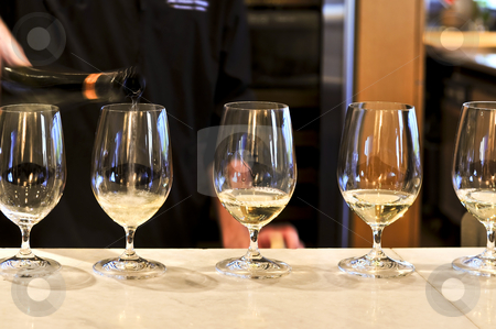 To use this stock image in your creative project, please select the size you need over to the right and click the "Add to Cart" button.
Your downloaded image will come with the Cutcaster watermark removed so don’t worry about the watermark you see on this page. Wine tasting glasses stock photo, Row of white wine glasses in winery tasting event by Elena Elisseeva