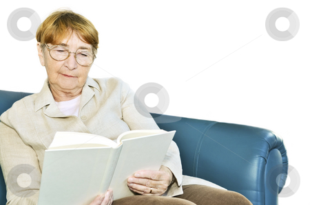 To use this stock image in your creative project, please select the size you need over to the right and click the "Add to Cart" button.
Your downloaded image will come with the Cutcaster watermark removed so don’t worry about the watermark you see on this page. Old woman reading book stock photo, Elderly woman relaxing on couch reading a book by Elena Elisseeva