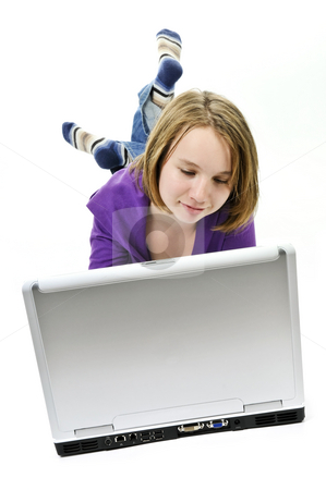 To use this stock image in your creative project, please select the size you need over to the right and click the "Add to Cart" button.
Your downloaded image will come with the Cutcaster watermark removed so don’t worry about the watermark you see on this page. Girl with computer stock photo, Young girl lying down with laptop computer by Elena Elisseeva