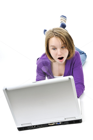 To use this stock image in your creative project, please select the size you need over to the right and click the "Add to Cart" button.
Your downloaded image will come with the Cutcaster watermark removed so don’t worry about the watermark you see on this page. Girl with computer stock photo, Surprised young girl lying down with laptop computer by Elena Elisseeva