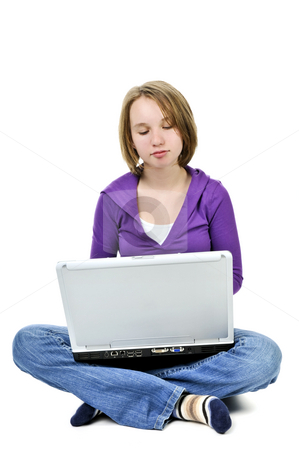 To use this stock image in your creative project, please select the size you need over to the right and click the "Add to Cart" button.
Your downloaded image will come with the Cutcaster watermark removed so don’t worry about the watermark you see on this page. Girl with computer stock photo, Young girl sitting cross legged with laptop computer by Elena Elisseeva