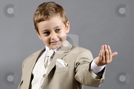 To use this stock image in your creative project, please select the size you need over to the right and click the "Add to Cart" button.
Your downloaded image will come with the Cutcaster watermark removed so don’t worry about the watermark you see on this page. School boy stock photo, Portrait of school boy in elegant costume by Dragos Iliescu