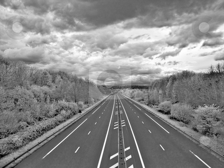 To use this stock image in your creative project, please select the size you need over to the right and click the "Add to Cart" button.
Your downloaded image will come with the Cutcaster watermark removed so don’t worry about the watermark you see on this page. Highway to hell stock photo, Infrared picture of an empty highway with stormy clouds hdr processed by Laurent Dambies