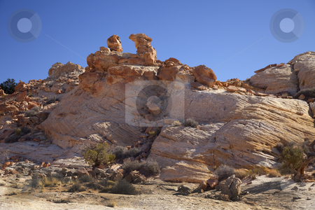 To use this stock image in your creative project, please select the size you need over to the right and click the "Add to Cart" button.
Your downloaded image will come with the Cutcaster watermark removed so don’t worry about the watermark you see on this page. San Rafael Swell stock photo, View of red rock formations in San Rafael Swell with blue sky by Mark Smith
