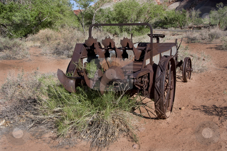 To use this stock image in your creative project, please select the size you need over to the right and click the "Add to Cart" button.
Your downloaded image will come with the Cutcaster watermark removed so don’t worry about the watermark you see on this page. Americana stock photo, Old wagon in the desert with blue sky and green trees by Mark Smith