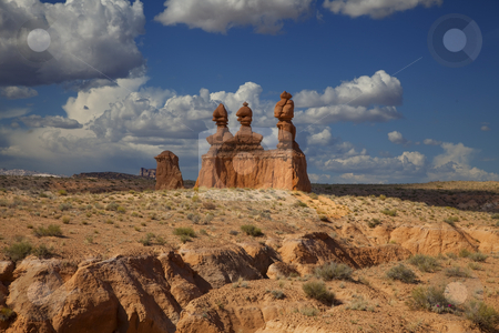 To use this stock image in your creative project, please select the size you need over to the right and click the "Add to Cart" button.
Your downloaded image will come with the Cutcaster watermark removed so don’t worry about the watermark you see on this page. San Rafael Swell stock photo, View of red rock formations in San Rafael Swell with blue sky by Mark Smith