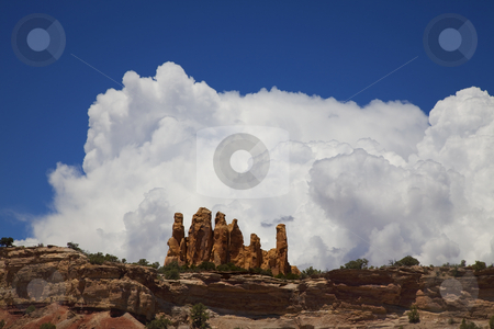 To use this stock image in your creative project, please select the size you need over to the right and click the "Add to Cart" button.
Your downloaded image will come with the Cutcaster watermark removed so don’t worry about the watermark you see on this page. San Rafael Swell stock photo, View of red rock formations in San Rafael Swell with blue sky by Mark Smith