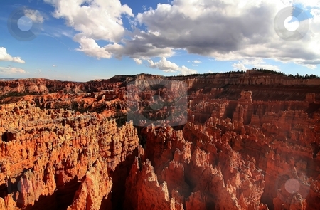 To use this stock image in your creative project, please select the size you need over to the right and click the "Add to Cart" button.
Your downloaded image will come with the Cutcaster watermark removed so don’t worry about the watermark you see on this page. Bryce Canyon national Park stock photo, View of the red rock formations in Bryce Canyon National Park by Mark Smith
