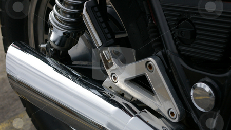 To use this stock image in your creative project, please select the size you need over to the right and click the "Add to Cart" button.
Your downloaded image will come with the Cutcaster watermark removed so don’t worry about the watermark you see on this page. Motorcycle Exhaust stock photo, A close up of a motorcycle exhaust and rear peg. by Tom Weatherhead