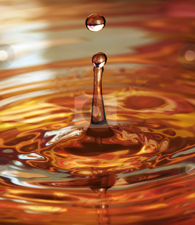To use this stock image in your creative project, please select the size you need over to the right and click the "Add to Cart" button.
Your downloaded image will come with the Cutcaster watermark removed so don’t worry about the watermark you see on this page. Colourful water drop stock photo, A drop of water by Paul Turner