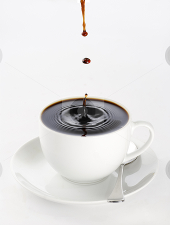 To use this stock image in your creative project, please select the size you need over to the right and click the "Add to Cart" button.
Your downloaded image will come with the Cutcaster watermark removed so don’t worry about the watermark you see on this page. Coffee drops stock photo, A cup of black coffee full to the brim with drops splashing on the surface threatening to spill over. by Paul Turner