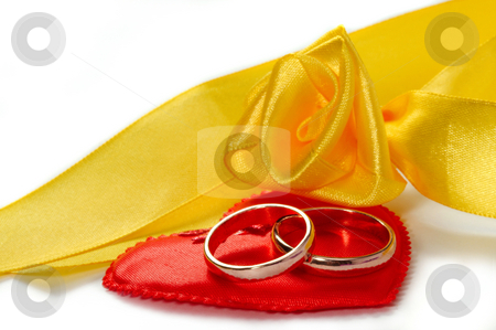 To use this stock image in your creative project, please select the size you need over to the right and click the "Add to Cart" button.
Your downloaded image will come with the Cutcaster watermark removed so don’t worry about the watermark you see on this page. Wedding rings stock photo, Two wedding ring on a white background. by Sergey Goruppa