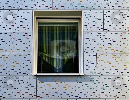 To use this stock image in your creative project, please select the size you need over to the right and click the "Add to Cart" button.
Your downloaded image will come with the Cutcaster watermark removed so don’t worry about the watermark you see on this page. Window in modern metal facade stock photo, Window in a modern metal facade with color mosaic by Juraj Kovacik