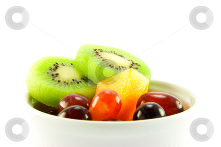 To use this stock image in your creative project, please select the size you need over to the right and click the "Add to Cart" button.
Your downloaded image will come with the Cutcaster watermark removed so don’t worry about the watermark you see on this page. Kiwi, Melon and Grapes stock photo, Pot of kiwi, melon and grapes with clipping path on a white background by Keith Wilson