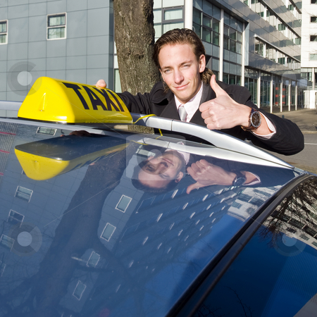 To use this stock image in your creative project, please select the size you need over to the right and click the "Add to Cart" button.
Your downloaded image will come with the Cutcaster watermark removed so don’t worry about the watermark you see on this page. Smiling taxi driver stock photo, A smiling taxi driver giving a thumbs up while placing his taxi sign on the roof of his car by Corepics VOF