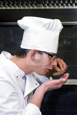 To use this stock image in your creative project, please select the size you need over to the right and click the "Add to Cart" button.
Your downloaded image will come with the Cutcaster watermark removed so don’t worry about the watermark you see on this page. Tasing chef stock photo, A chef tasting his work from a wooden ladle by Corepics VOF