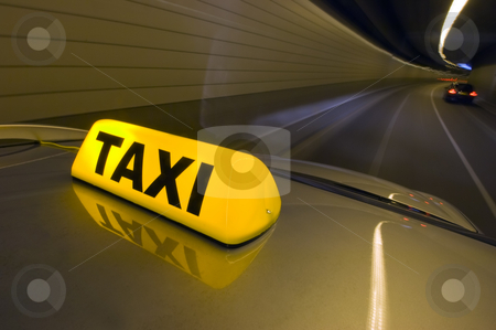 To use this stock image in your creative project, please select the size you need over to the right and click the "Add to Cart" button.
Your downloaded image will come with the Cutcaster watermark removed so don’t worry about the watermark you see on this page. Tunnel Taxi stock photo, A taxi driving at high speed through a tunnel, overtaking other cars by Corepics VOF