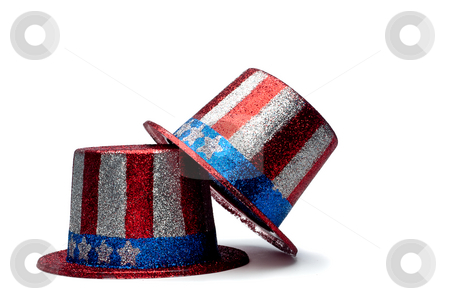 To use this stock image in your creative project, please select the size you need over to the right and click the "Add to Cart" button.
Your downloaded image will come with the Cutcaster watermark removed so don’t worry about the watermark you see on this page. A horizontal view of a pair of sparkling 4th of July celebration stock photo, A horizontal view of a pair of sparkling 4th of July celebration hats by Vince Clements