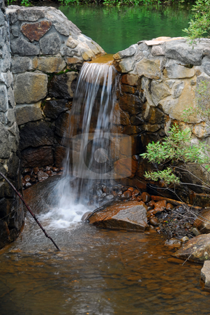 To use this stock image in your creative project, please select the size you need over to the right and click the "Add to Cart" button.
Your downloaded image will come with the Cutcaster watermark removed so don’t worry about the watermark you see on this page. Small water falls stock photo, Picture of a natural small water fall in summer by Alain Turgeon
