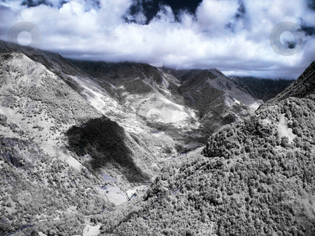To use this stock image in your creative project, please select the size you need over to the right and click the "Add to Cart" button.
Your downloaded image will come with the Cutcaster watermark removed so don’t worry about the watermark you see on this page. Dramatic mountain landscape stock photo, Mountain landscape in infrared view from Lescun in French pyrenees by Laurent Dambies