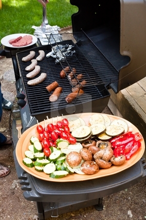 To use this stock image in your creative project, please select the size you need over to the right and click the "Add to Cart" button.
Your downloaded image will come with the Cutcaster watermark removed so don’t worry about the watermark you see on this page. Garden grilling stock photo, Grilling is a form of cooking that involves dry radiant heat from above or below, and takes place on a grill or griddle by Mariusz Jurgielewicz