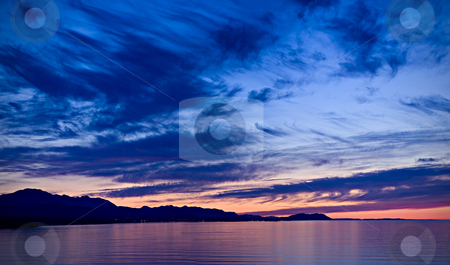 To use this stock image in your creative project, please select the size you need over to the right and click the "Add to Cart" button.
Your downloaded image will come with the Cutcaster watermark removed so don’t worry about the watermark you see on this page. Strait of Juan de Fuca Sunset stock photo, A beautiful sunset over the Strait of Juan de Fuca in Sequim. Panoramic photo. by Travis Manley