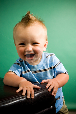 To use this stock image in your creative project, please select the size you need over to the right and click the "Add to Cart" button.
Your downloaded image will come with the Cutcaster watermark removed so don’t worry about the watermark you see on this page. Nine Month Old Boy stock photo, A portrait of a cute nine month old baby boy. by Travis Manley