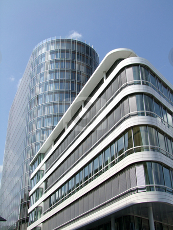 To use this stock image in your creative project, please select the size you need over to the right and click the "Add to Cart" button.
Your downloaded image will come with the Cutcaster watermark removed so don’t worry about the watermark you see on this page. Architecture stock photo, Modern architecture with glass windows by Birgit Reitz-Hofmann