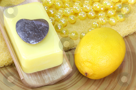 To use this stock image in your creative project, please select the size you need over to the right and click the "Add to Cart" button.
Your downloaded image will come with the Cutcaster watermark removed so don’t worry about the watermark you see on this page. Lemon soap stock photo, Lemon Soap and yellow accessories - body care by Birgit Reitz-Hofmann