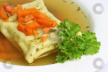 To use this stock image in your creative project, please select the size you need over to the right and click the "Add to Cart" button.
Your downloaded image will come with the Cutcaster watermark removed so don’t worry about the watermark you see on this page. Pasta Soup stock photo, Filled pasta in soup in detail. Shot in Studio by Birgit Reitz-Hofmann