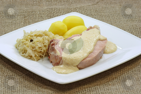 To use this stock image in your creative project, please select the size you need over to the right and click the "Add to Cart" button.
Your downloaded image will come with the Cutcaster watermark removed so don’t worry about the watermark you see on this page. Ham Meat stock photo, Traditional german pork meat with sauerkraut and potatoes by Birgit Reitz-Hofmann