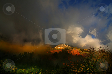 To use this stock image in your creative project, please select the size you need over to the right and click the "Add to Cart" button.
Your downloaded image will come with the Cutcaster watermark removed so don’t worry about the watermark you see on this page. Autumn Storm stock photo, High Mountain Flat in the fall showing all the fall colors with mountains in the background by Mark Smith