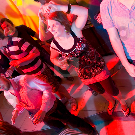 To use this stock image in your creative project, please select the size you need over to the right and click the "Add to Cart" button.
Your downloaded image will come with the Cutcaster watermark removed so don’t worry about the watermark you see on this page. Dancing woman in a nightclub stock photo, A dancing woman in a nightclub surrounded by a group of people. by Corepics VOF